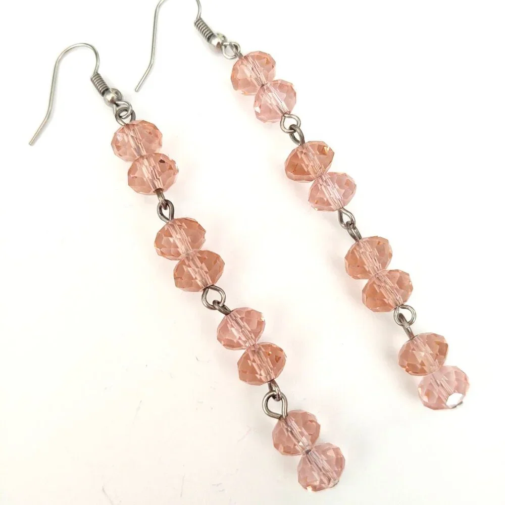 Faceted pink glass dangle earrings